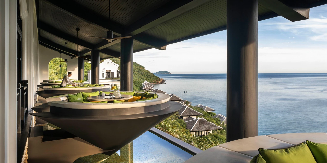 Citron’s conical-hat-inspired tables overlooking the bay