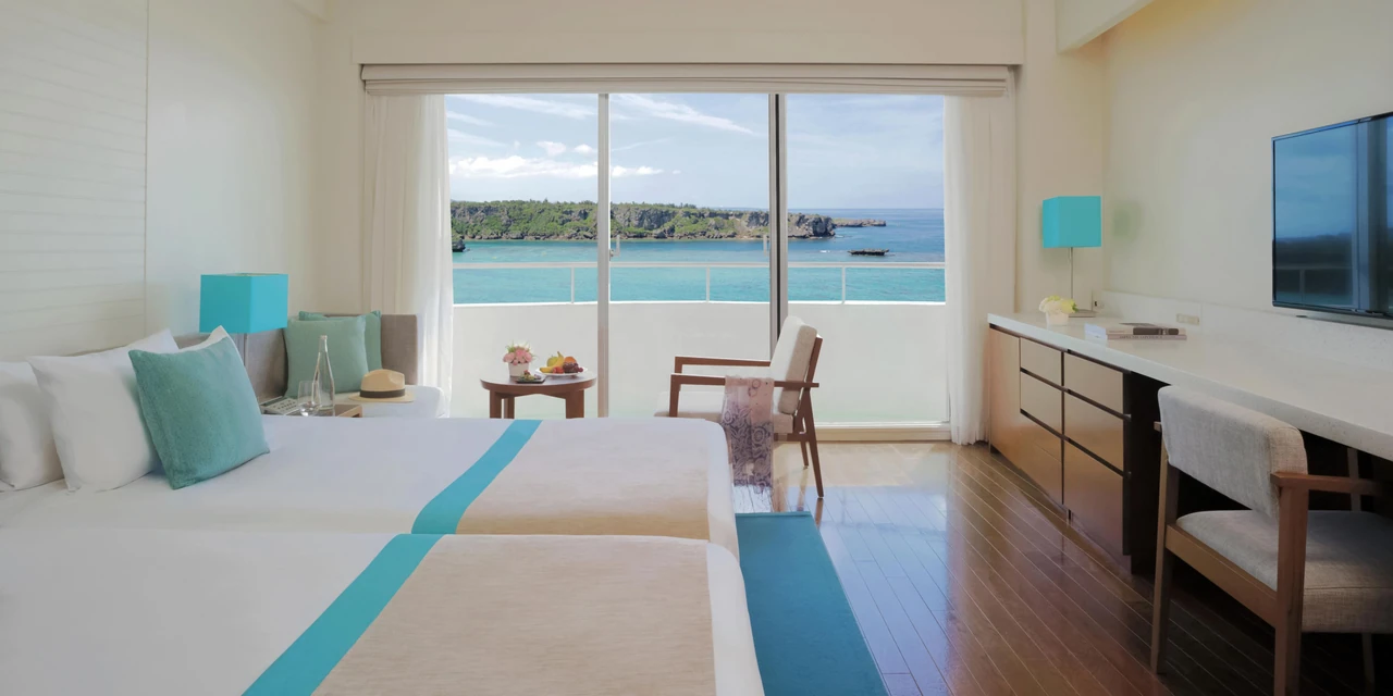 ANA InterContinental Manza Beach Resort · The hotel’s guest-room living and sleeping spaces