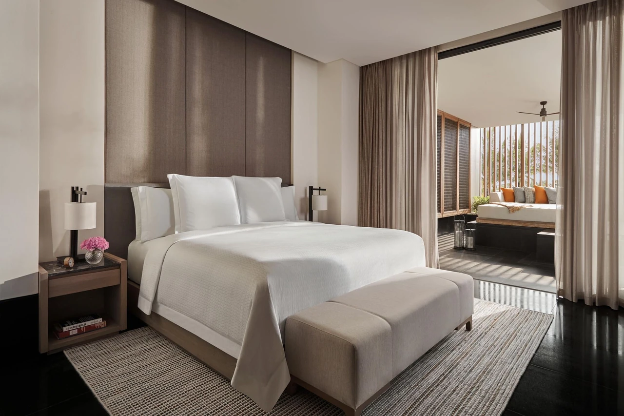 Bedroom and terrace seating in a Sky Pool Villa at Regent Phu Quoc